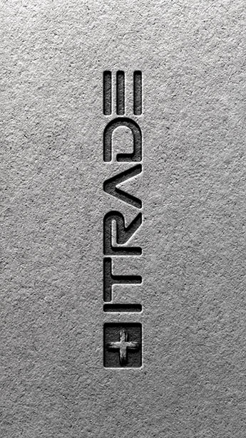 iTrade Logo on Textured Paper – Elegant logo presentation adding depth and refinement to the brand’s visual identity.